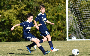 boys playing soccer